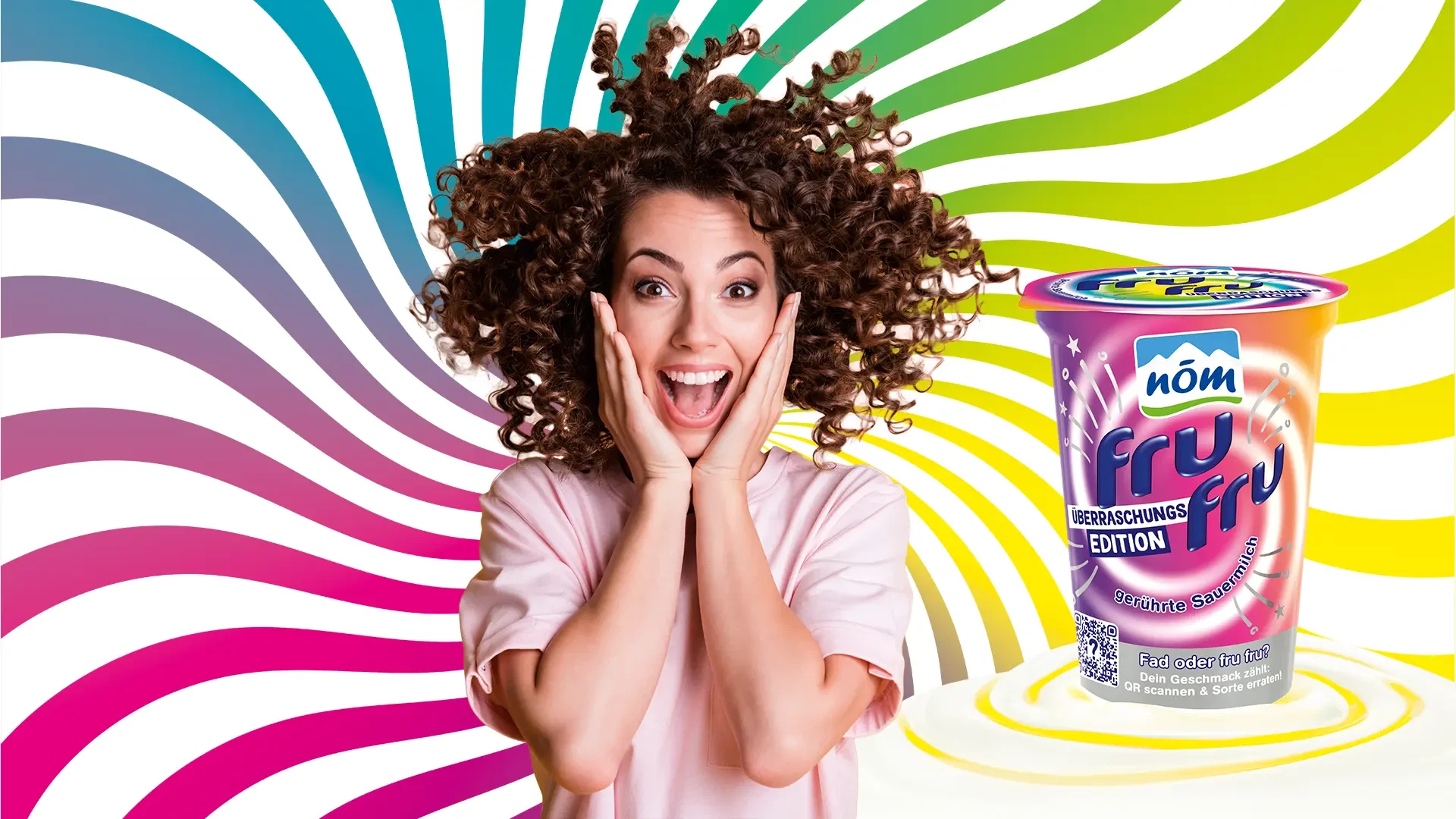 Interaktive KI-Kampagne für NÖM fru fru von der MMCAgentur: Eine überraschte Frau mit Locken vor einer bunten Regenbogen-Spirale neben dem neuen Überraschungs-Edition Becher.